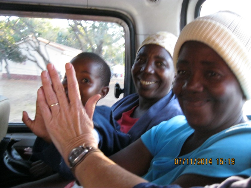 In a public taxi- there were 11 of us squeezed in and cost us 50 cents